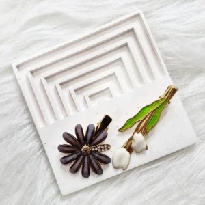 گیره مو وارداتی بسته 2 عددی طرح بابونه و لاله